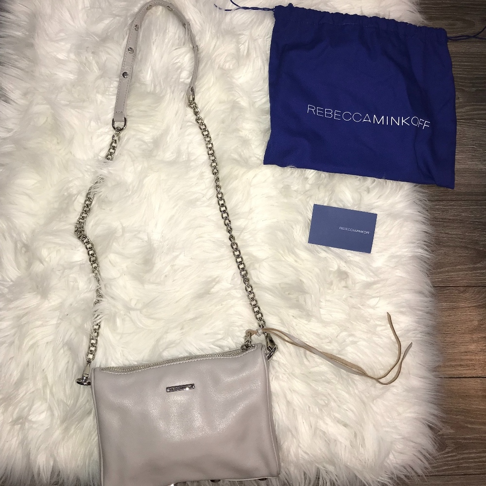 Never worn Rebecca Minkoff 5-zip Crossbody Bag!